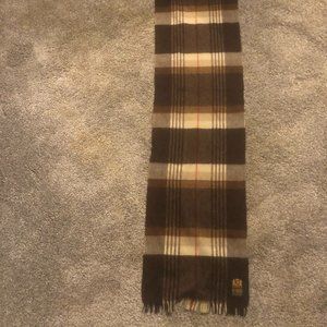 Multi-color scarf. Brown, beige, tan and white with thin red stripe. 52" x 11".